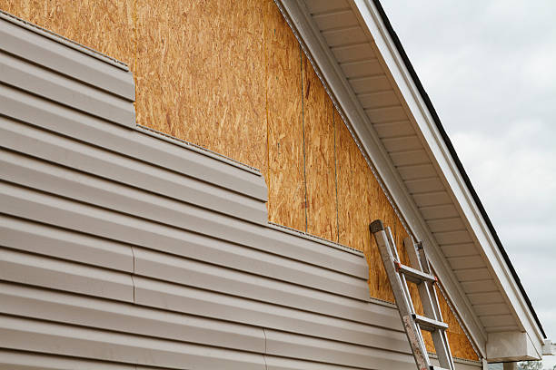 Professional Siding Installation technician working in Milton, WV